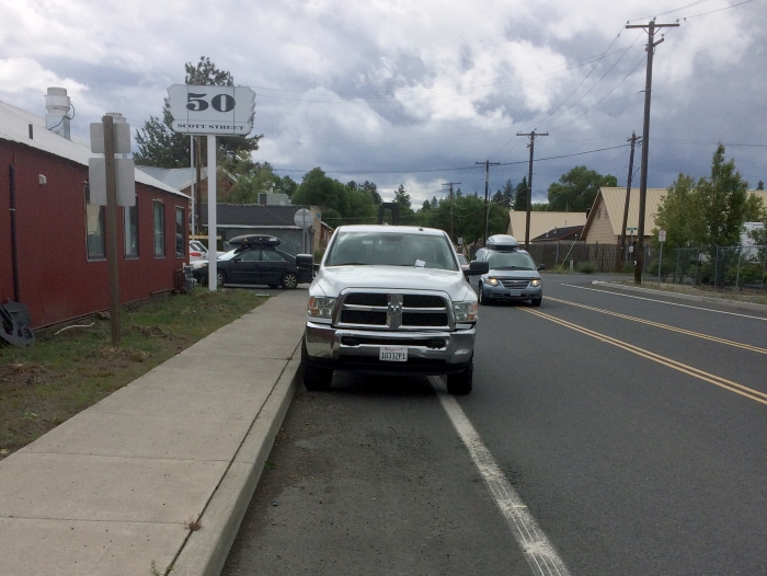 Truck in bike lane on NE Scott Street in Bend